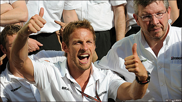 Jenson Button celebrates victory in Monaco