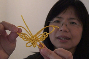 Tuang-Jung loves the traditional art of making Chinese knots but she fears the skill could be lost as the next generation looses interest in Chinese traditions.