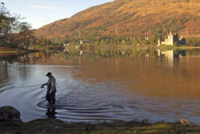 a man fishing in a lake