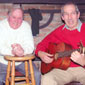 Brian Dooley on guitar with the late Gene Carroll, on the stage at Teac Mallon, Jan '06