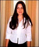 Claire trying on clothes