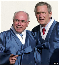 Australian Premier John Howard (L) and US President George W. Bush chat after the Asia Pacific Economic Cooperation (APEC) leaders' official photo at the Nurimaru APEC House, in Busan 19 November 2005. PAUL J RICHARDS/AFP/Getty Images