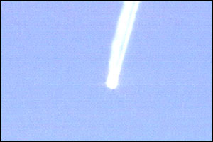 Televizní závěr raketoplánu, který se řítí k zemi