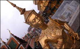 Gilded Mythical being at the Wat Phra Kaeo temple in Bangkok