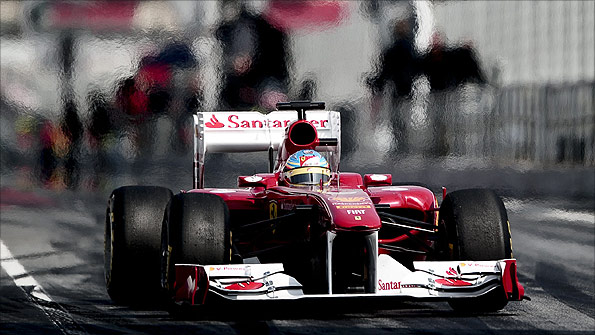 Fernando Alonso's Ferrari in the pit lane at the Circuit de Catalunya