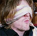 Andy blindfolded