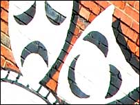 Masks sign on Bradford Playhouse wall