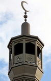 Minaret of the East London Mosque in Whitechapel, topped with crescent moon