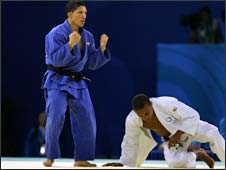 Taraje Williams-Murray of the United States on the mat after losing a judo bout to Javier Antonio Guedez Sanchez of Venezuela at the Beijing Olympics. 