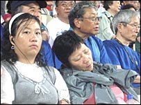 Chineses dormem em prova (Foto: Marina Wentzel/BBC Brasil)