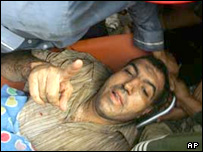 Homem preso nas ferragens