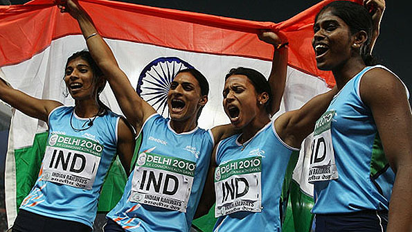 India's victorious women's 4x400m quartet celebrate their country's first Commonwealth track title since 1958. 