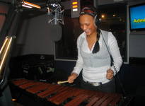 Zena playing 'Bed' on the xylophone