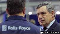 British Prime Minister Gordon Brown listens to an apprentice at the Rolls-Royce Learning and Development Centre on January 7, 2009 in Derby. Leon Neal/WPA Pool/Getty Images