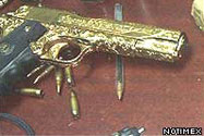 A gold encrusted gun