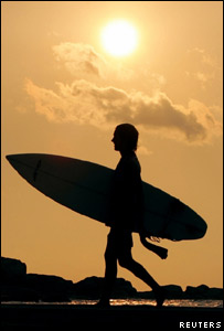 A Canadian surfer walks along the beach at Hikkaduwa (file photo)