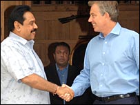 Tony Blair (R) with Mahinda Rajapaksa. Then Foreign Minister Mangala Samaraweera in the background