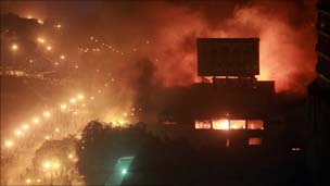 A fire burns at the headquarters of the ruling National Democratic Party in Cairo