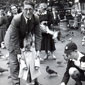 Minnie's husband Eddie with their 3 children, feeding the birds in Trafalgar Square, London - 1955