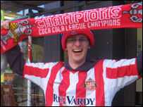 Sunderland fan waving a scarf