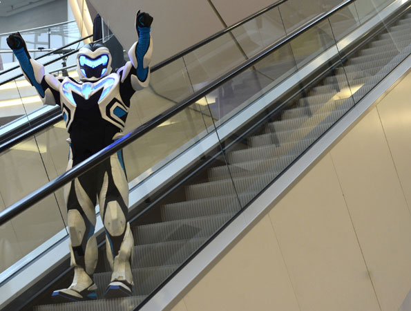A performer dressed as a robot at the toy fair in Germany