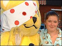 Picture: Pudsey with one of his fans: link.
