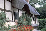 The Hathaway house in Shottery. It still contains Tudor furniture, including perhaps William and Anne's marital bed
