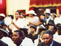 Black churchgoers singing