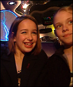 Daisy with friend in the limousine