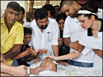 Hirunika Premachandra (R) with her father's remains