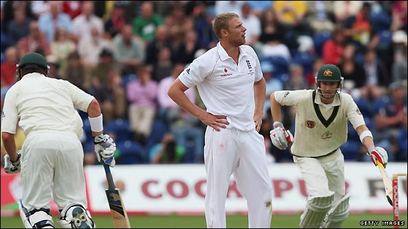 Andrew Flintoff shows his frustration as Michael Clarke and Marcus North pile on the runs