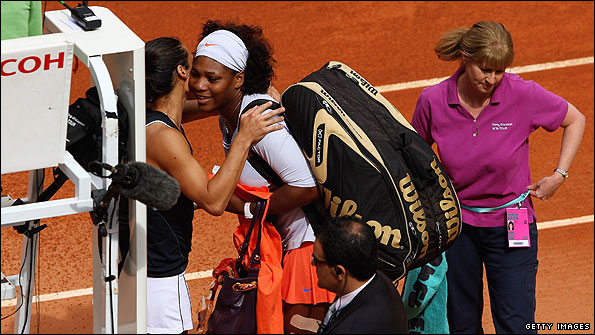 Francesca Schiavone consoles Serena Williams after she retired injured during their first round match in Madrid