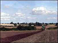Tractor in ploughed field