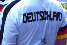 A man wearing a Germany football shirt