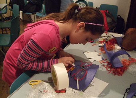 A girl at a previous workshop at the Glynn Vivian Art Gallery