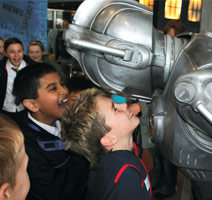 A child face-to-face with a Cyberman