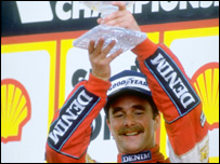Nigel Mansell celebrates winning the GP in 1987