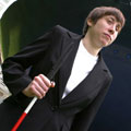 Liz Ball, with her red and white cane