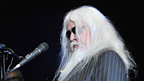 Leon Russell on piano during one of his solo songs.