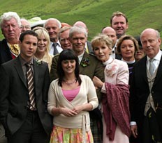 The cast of Monarch at the church.