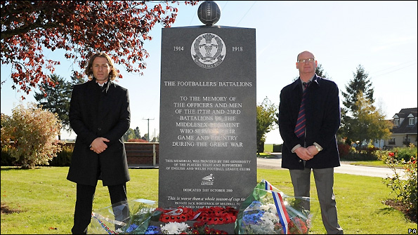 Gareth Ainsworth (left) and Phil Stant beside the memorial in Longueval.