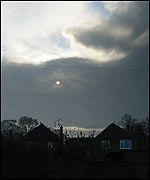 The skies dark with thick smoke.