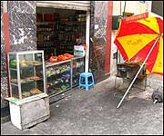 BBQ stall selling courgette kebabs