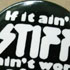 detail of a Stiff Records badge