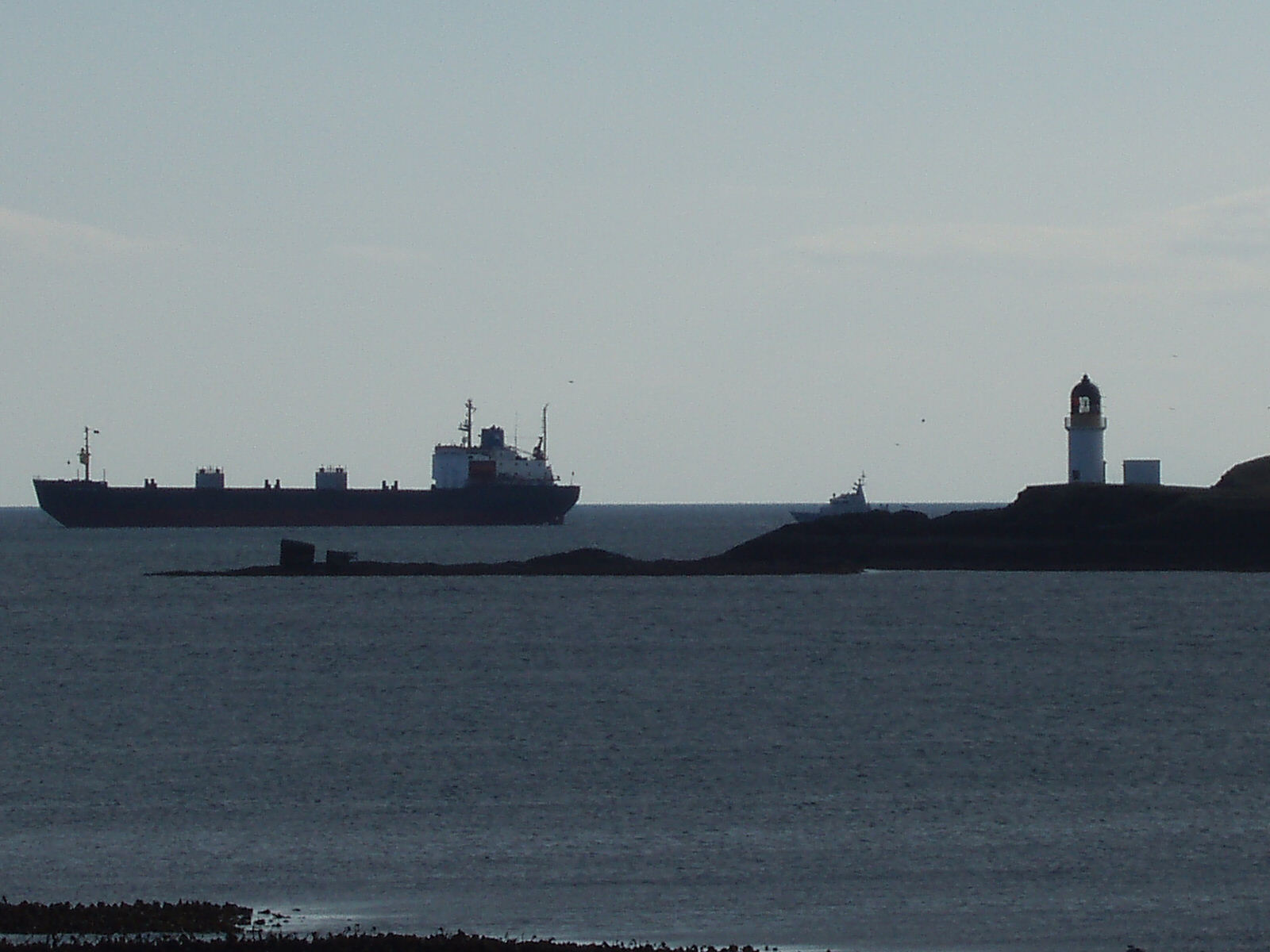 Alexandr Newski to the left, navy vessel to the right, off Arnish Light