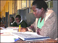 Teacher marking schoolwork