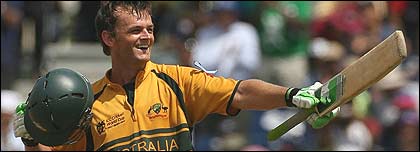 Gilchrist reaches his century