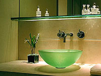 Downlighter above glass sink