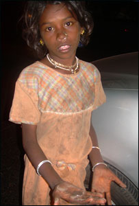 Young girl begging