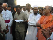 Bishop Swamipillai (L) attending a religious ceremony